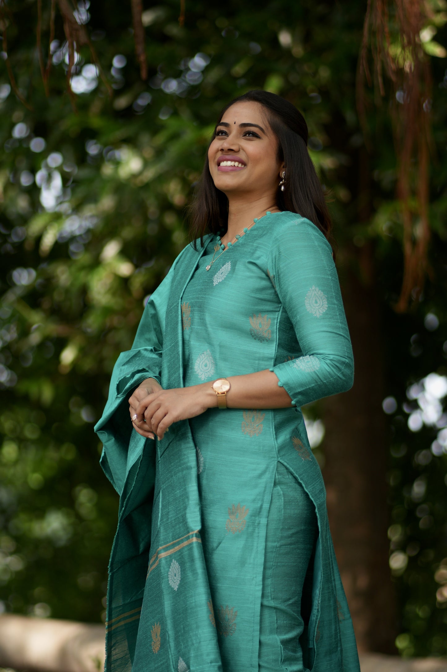 Ilavarasi Raw Silk Salwar Set in Dark Green